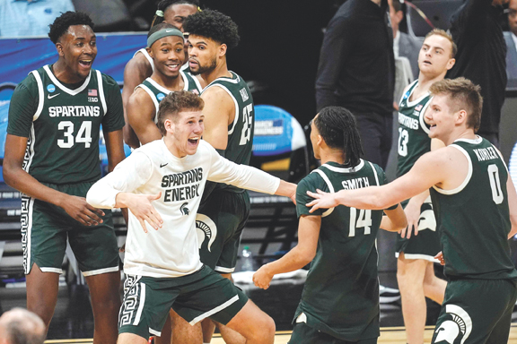 Michigan State head men’s basketball coach Tom Izzo looks for first
